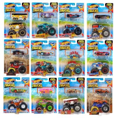 Hot Wheels Monster Trucks - 1:64 Camion avec voiture bonus, assortiment | Jeux collectifs & Jeux de rôles